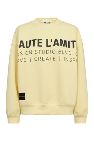 Studio Logo Sweat PALE YELLOW - HL10446